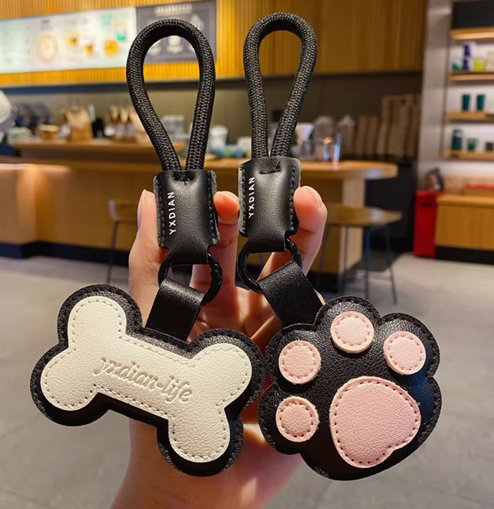 Cute Cat Paw/ White Dog Bone PU Leather Keychain – Soft 3D Charm for Keys, Bags & Gifts