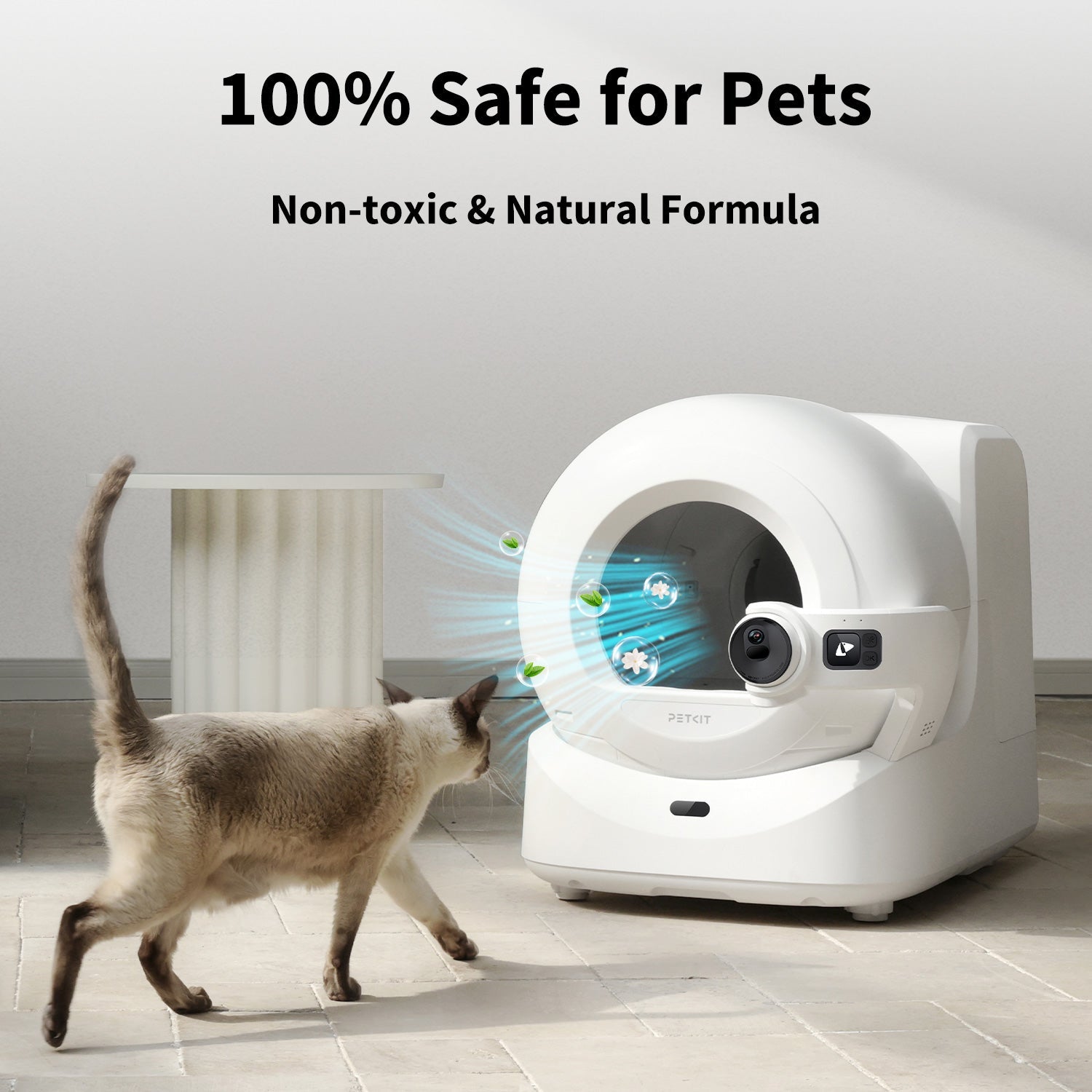 Cat approaching PUROBOT Ultra litter box with PETKIT N60 installed, emitting fresh jasmine scent.