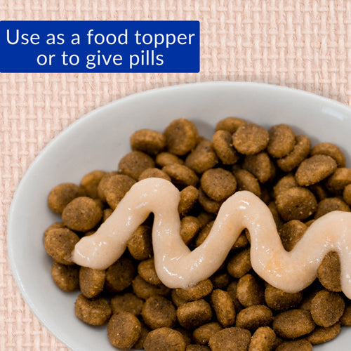 "Creamy tuna Churu treat used as a food topper for kitten kibble."
